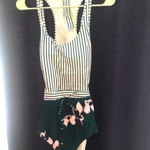 New swimsuit, never worn.  Cut out back with tie.